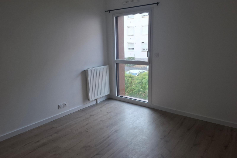 Appartement T2 en location à SAINT-JACQUES DE LA LANDE (GES04310060-610) - Photo 4